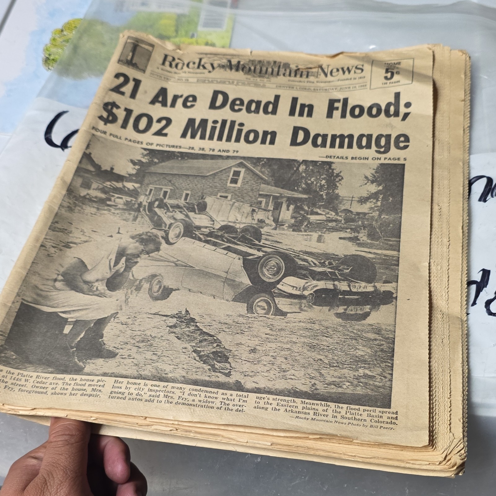 Rocky Mountain News Newspaper Issue: 21 Dead In Flood; Elvis “Tickle Me” Ad