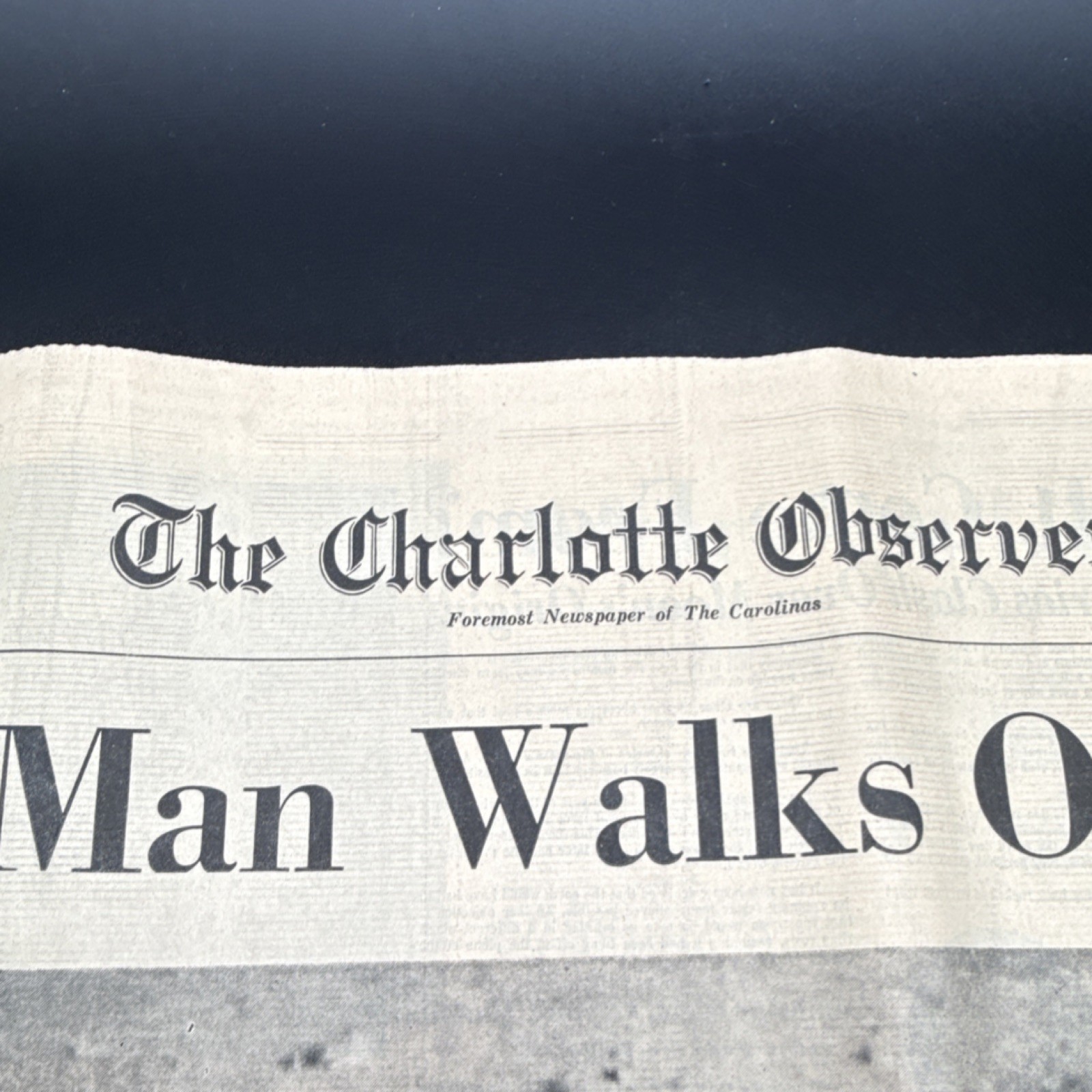The Charlotte Observer newspaper reporting on the Apollo 11 moon landing.