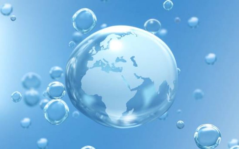 Planet Earth in crystal transparent drop on blue bubble background showing Africa and Europe. Abstract concept 3D animation for World Water Day, clean sustainable resources and global climate change.